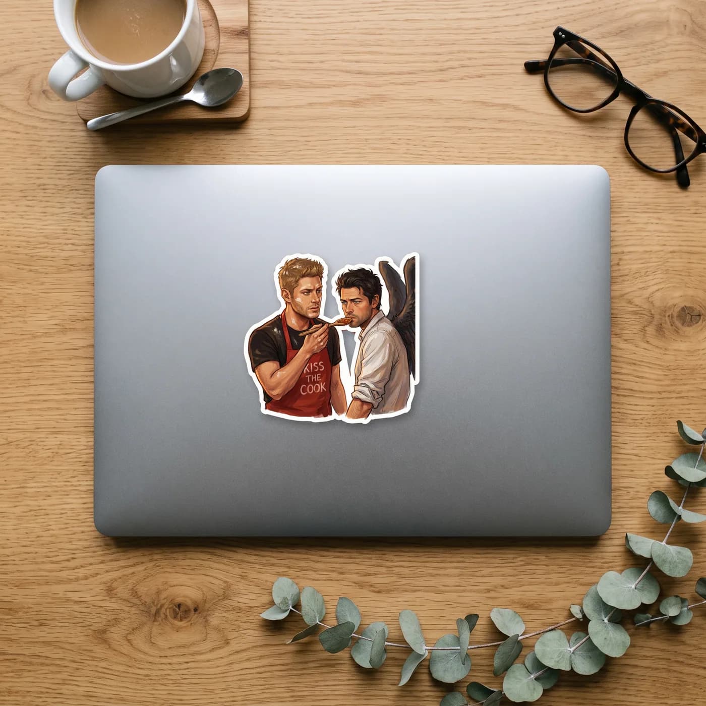 Castiel leans in to taste the warm food directly from the wooden spoon Dean offers him., view 2